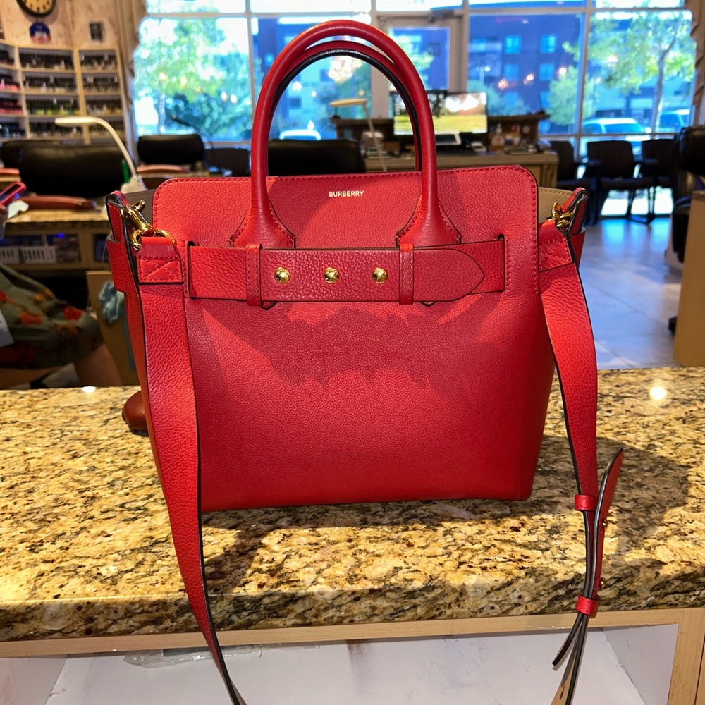 Authentic Burberry medium-sized tote in red, featuring gold studs on the front. - Picture 3 of 11